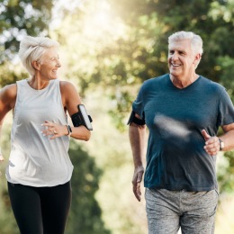 a man and a woman jogging outdoors